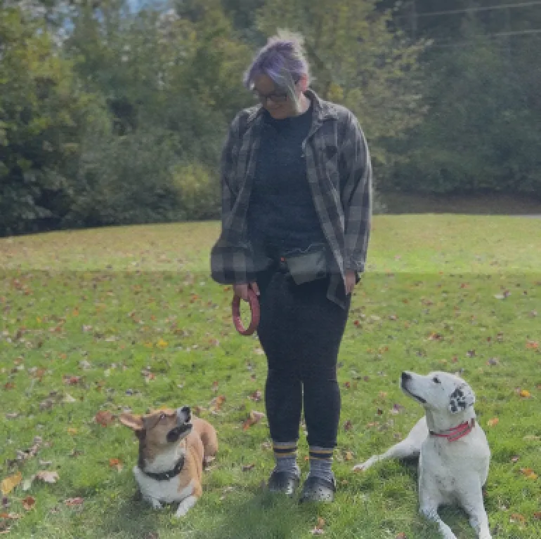 Photo of Megan and her two dogs