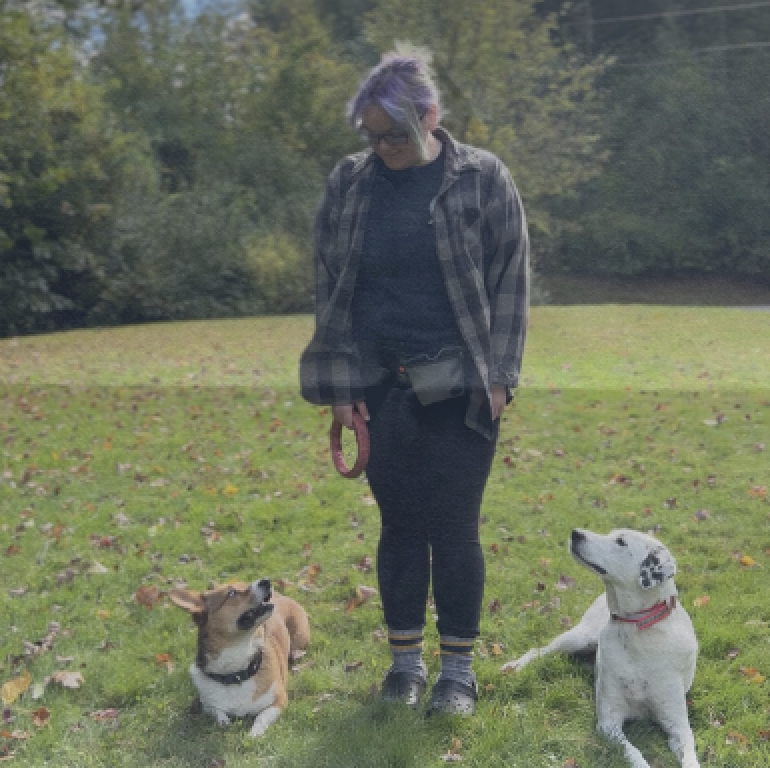 Photo of Megan and her two dogs